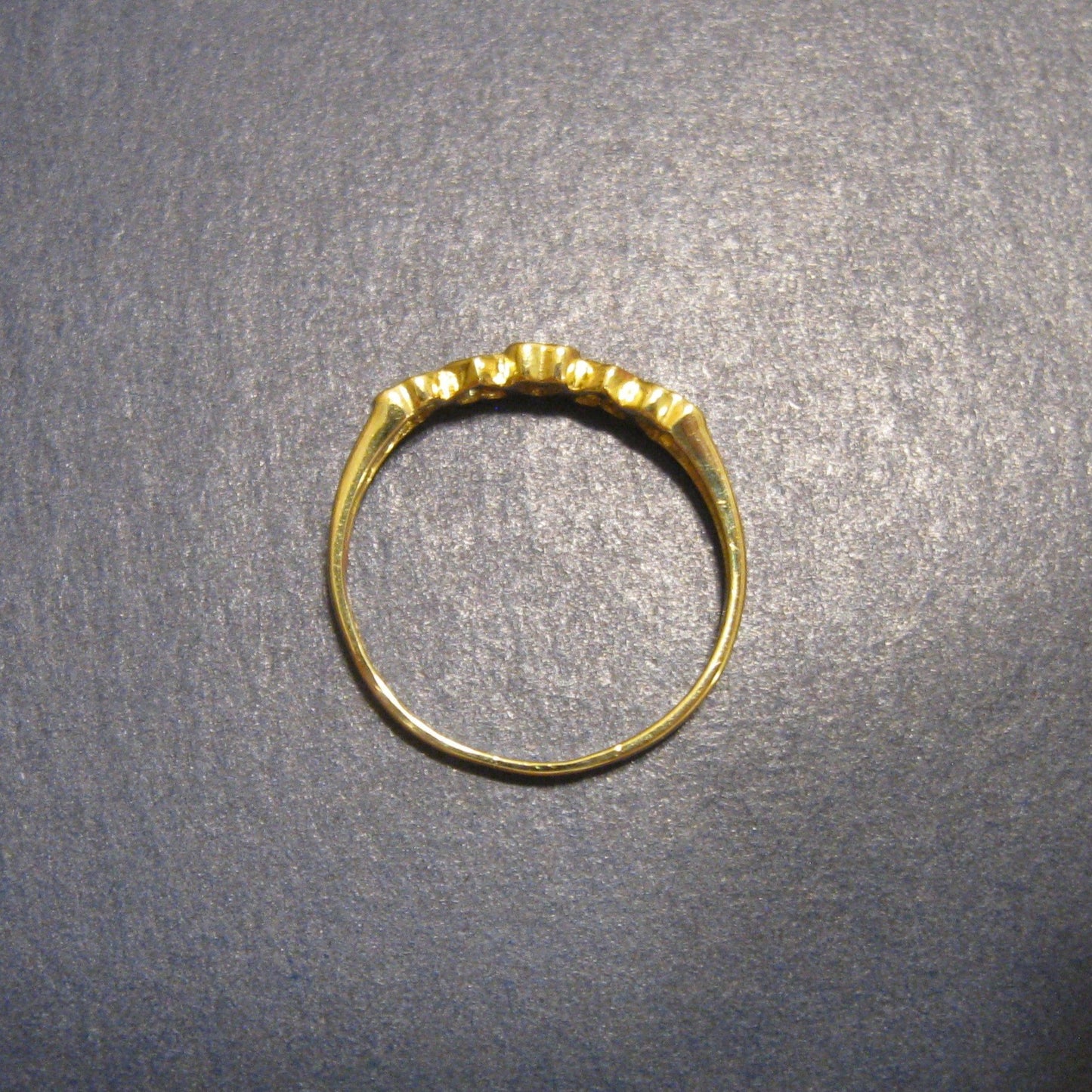 10k yellow Gold Ring with 5 Dark Blue Stones bezel set in Hearts.